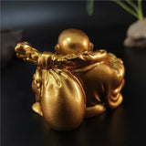 Statue Bouddha rieur doré en résine