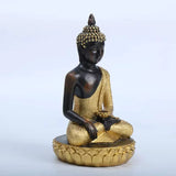 Statue Bouddha dorée sur socle lotus