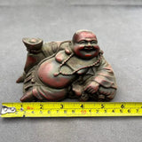 Statue Bouddha rieur allongé