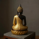 Statue Bouddha dorée sur socle lotus porté