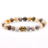 Bracelet bouddhiste onyx et tête de Bouddha