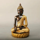 Statue Bouddha dorée sur socle lotus