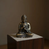 Statuette Bouddha Sakyamuni assis porté