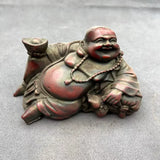 Statue Bouddha rieur allongé