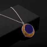 Pendentif lune et glyphes, cabochon verre